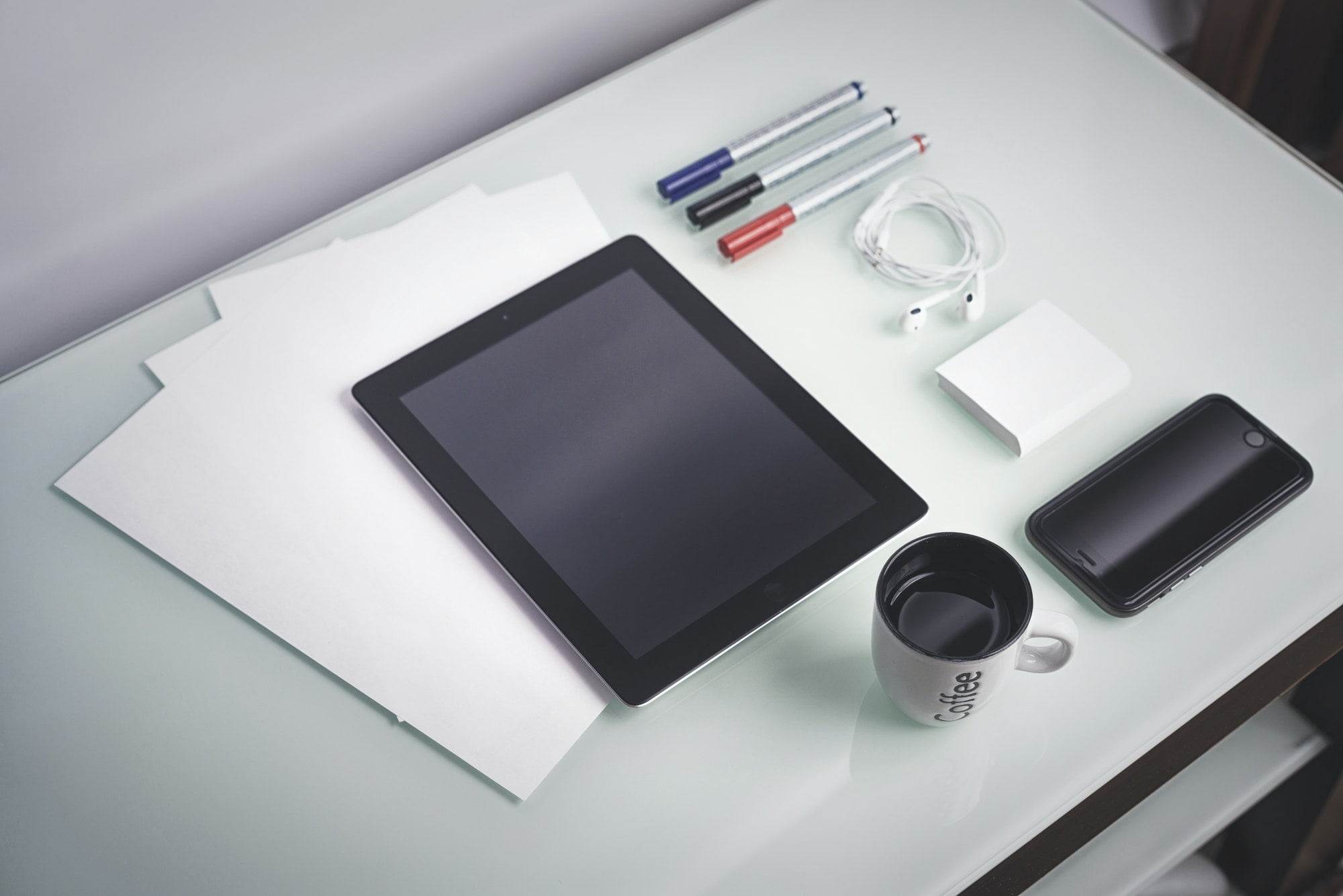 smartphone and tablet on a table concept for Web coffee a businessman's workplace